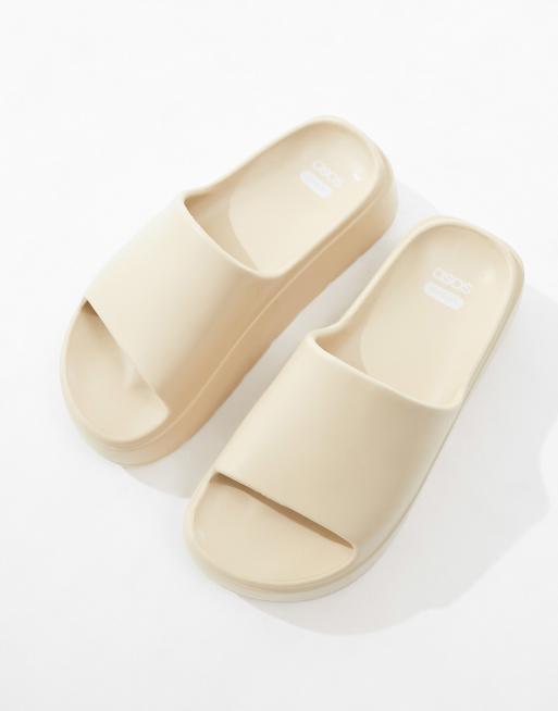 ASOS DESIGN Freedom cleated flatform slides in off-white | ASOS