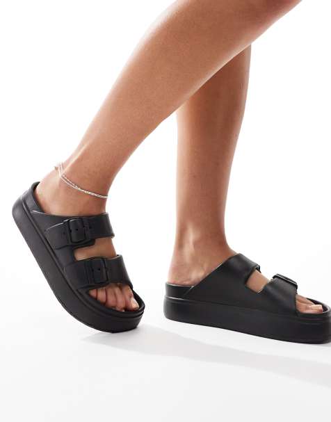 ASOS DESIGN – Freestyle – Czarne klapki na płaskiej platformie z wkładką i dwiema klamrami - view 1