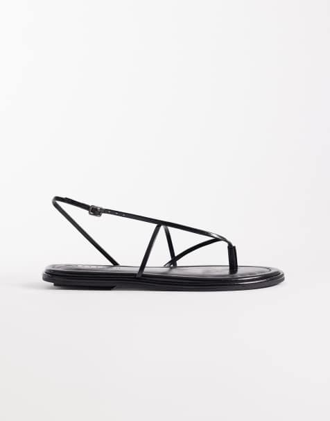 ASOS DESIGN Freya strappy flip flop flat sandals in black - view 1