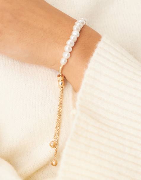 ASOS DESIGN friendship bracelet with faux freshwater pearls in gold tone - view 1