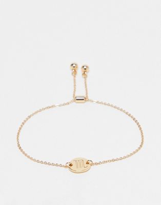 ASOS DESIGN friendship bracelet with Scorpio star sign in gold tone