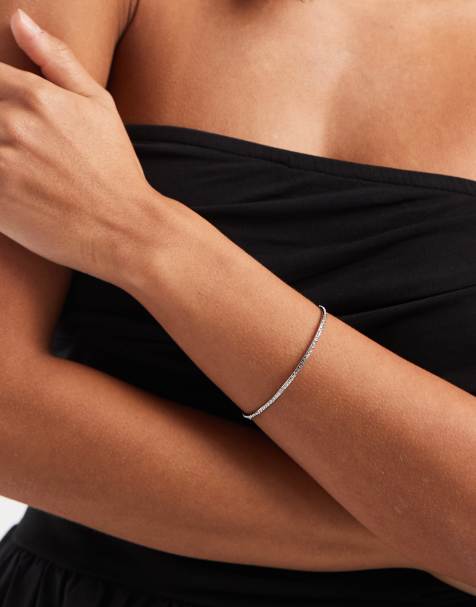 ASOS DESIGN friendship bracelet with toggle detail and sparkly crystal embellishment in silver tone - view 1