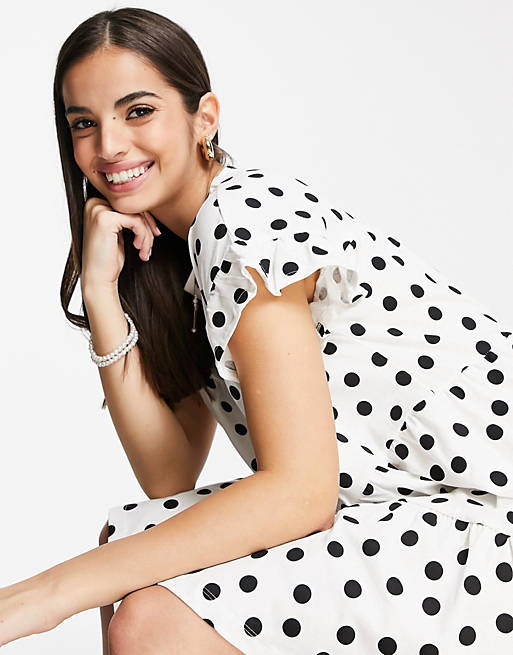  frill sleeve tiered smock dress in mono spot 
