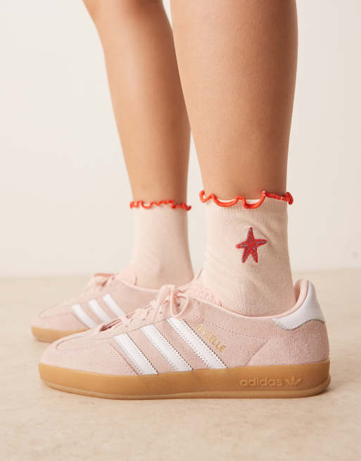 ASOS DESIGN frill top socks with embroidered starfish design in pink 