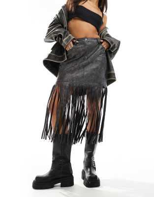 fringe leather look mini skirt in washed gray