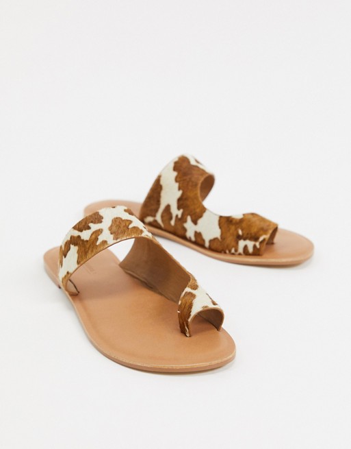 ASOS DESIGN Frome toe loop flat sandals in cow pony