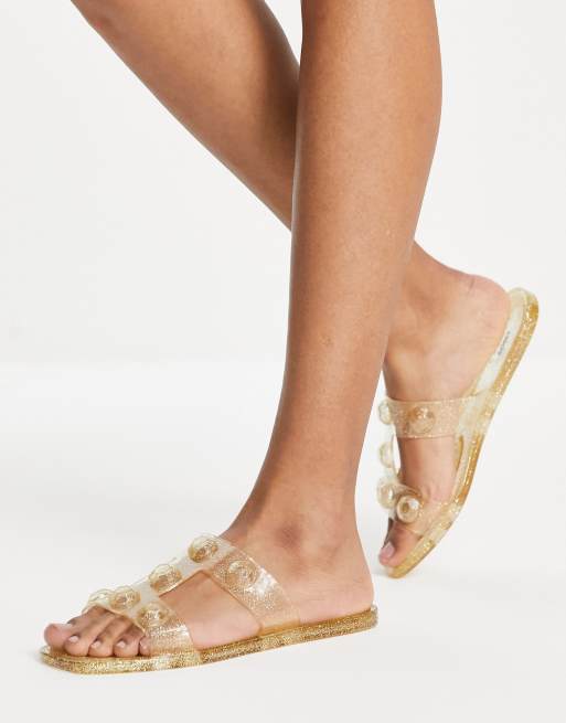 ASOS DESIGN - Fuel - Platte jelly sandalen met studs in glitter