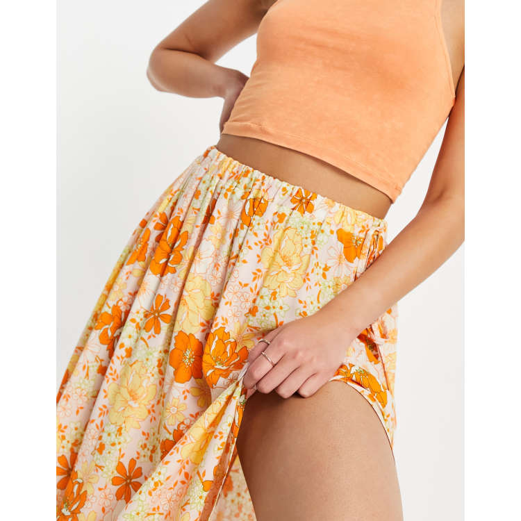 ASOS DESIGN full midi skirt in 70s orange floral print ASOS