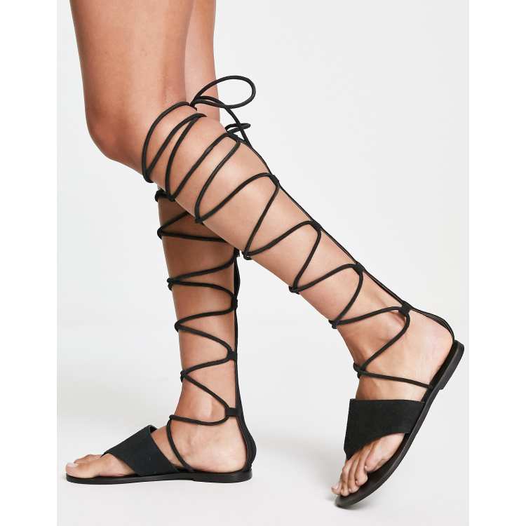 Black knee 2024 high sandals