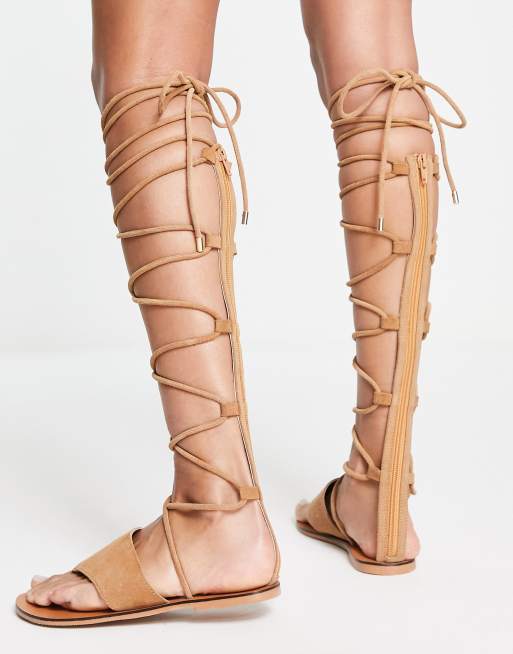 Over the store knee gladiator sandals