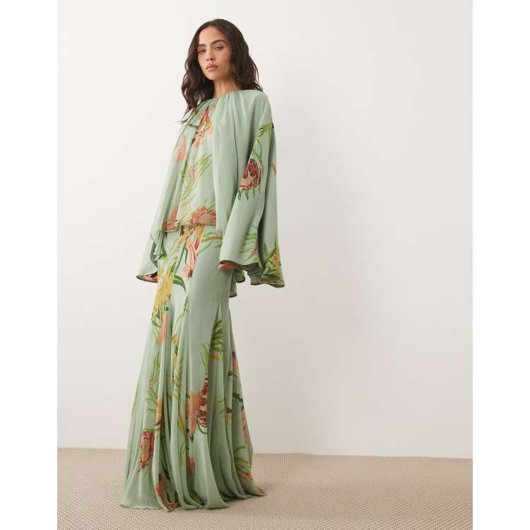 asos design cape sleeve godet maxi dress in forest green ASOS DESIGN full volume cape maxi dress with godets in light blue & green  floral print
