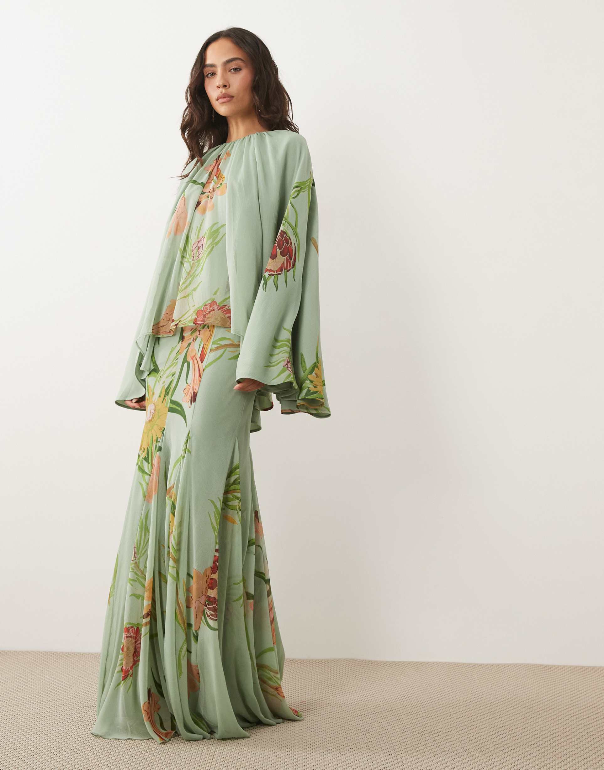 asos design full volume cape maxi dress with godets in light blue & green floral print