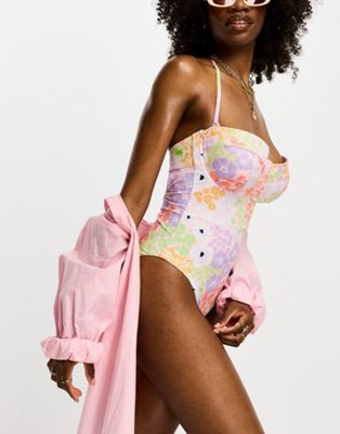 ASOS DESIGN Fuller Bust cupped underwired swimsuit in pastel ditsy floral