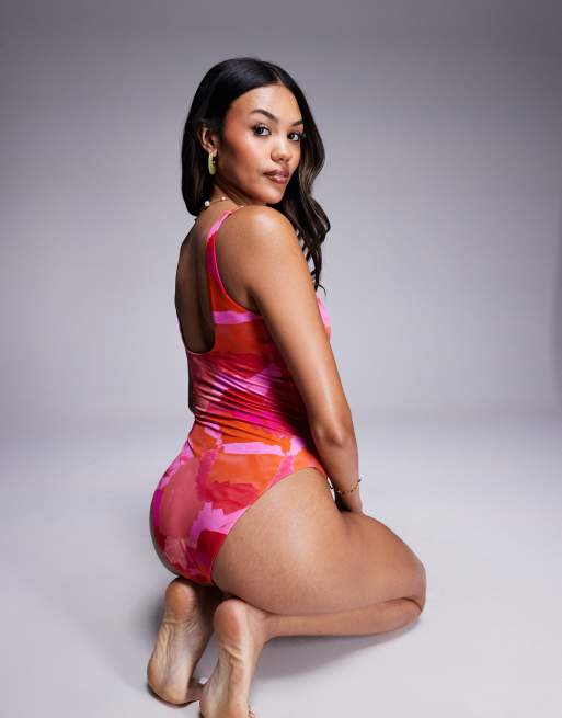 ASOS DESIGN Fuller Bust Exclusive Arina ultimate revenge sculpting square neck swimsuit in pink & red abstract print