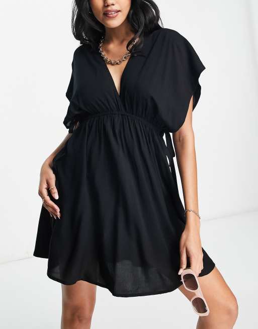 https://images.asos-media.com/products/asos-design-fuller-bust-flutter-sleeve-mini-beach-dress-with-channelled-tie-waist-in-black/203801055-1-black?$n_640w$&wid=513&fit=constrain