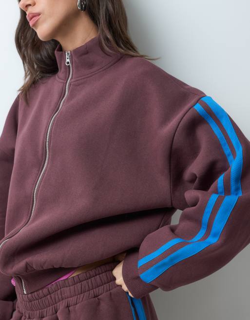 ASOS DESIGN zip-up jacket and track pants set in brown with blue stripe, 2 of 3