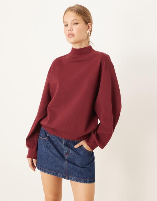 ASOS DESIGN funnel neck sweatshirt with rib panel detail in burgundy
