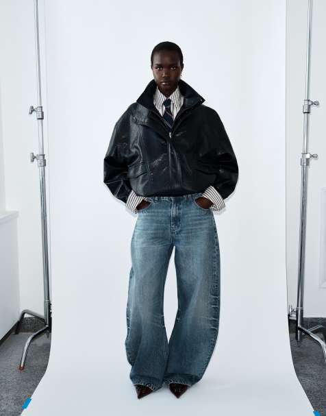 ASOS DESIGN funnel oversized leather look bomber jacket in black - view 1