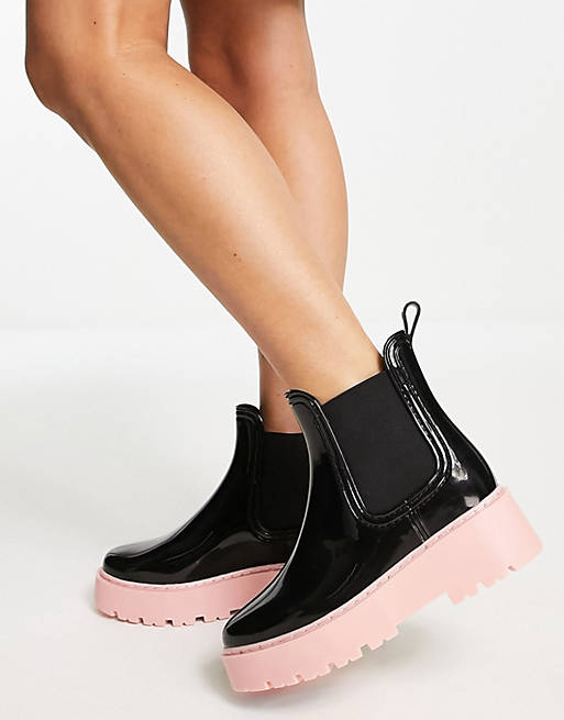 ASOS DESIGN Gadget chunky chelsea wellies in black with pink sole