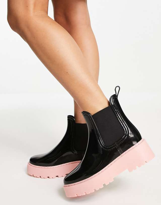 ASOS DESIGN Gadget chunky chelsea wellies in black with pink sole