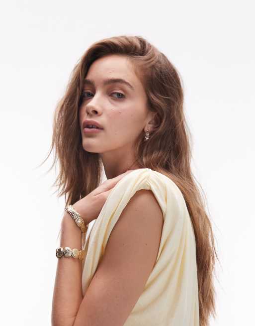 ASOS DESIGN gathered bubble hem shoulder pads top in buttermilk, 3 of 4