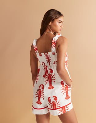 ASOS DESIGN gathered bust detail mini romper with contrast binding in lobster print