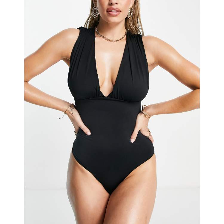 ASOS DESIGN gathered ruched cut out swimsuit in black