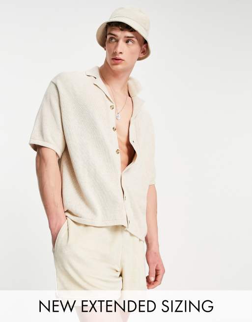 ASOS DESIGN - Gebreide polo van halfzware stof met knoopsluiting in beige