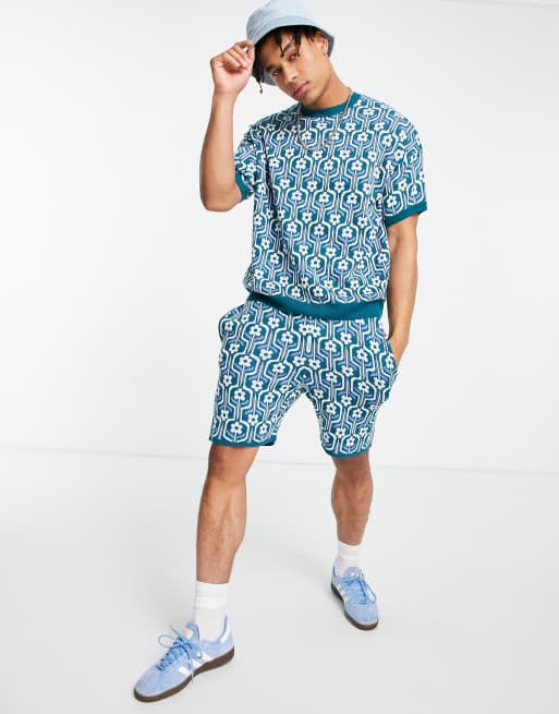 ASOS DESIGN - Gebreide short met bloemenprint in blauw, deel van co-ord set