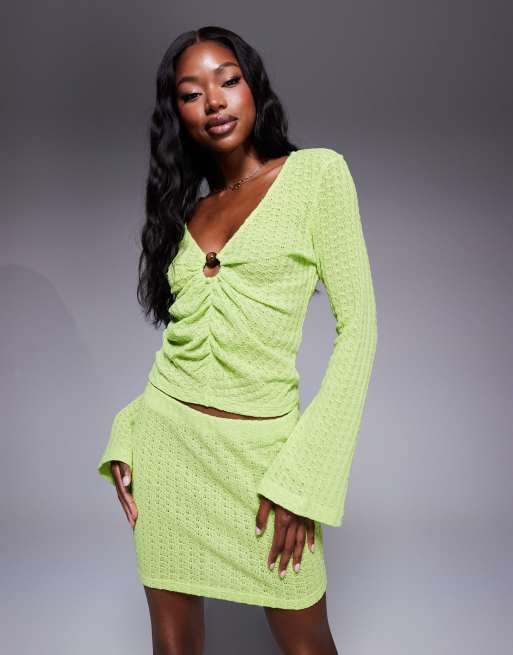 ASOS DESIGN - Gebreide top met lange mouwen en metalen detail in groen, deel van co-ord set