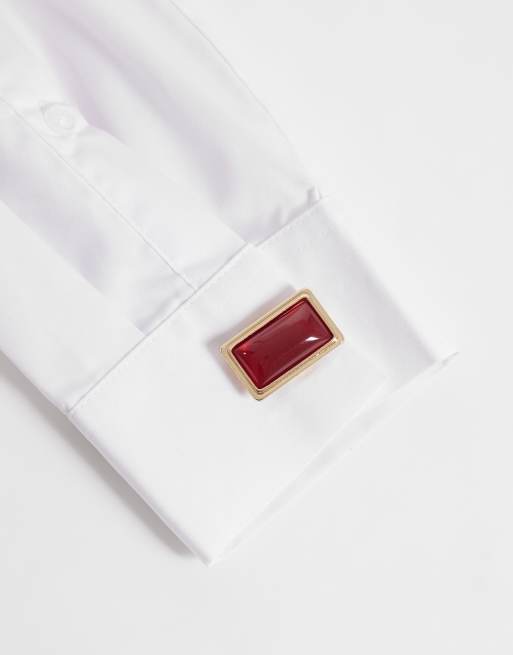ASOS DESIGN - Gemelos rectangulares con tapa de botón y engaste de piedra burdeos en tono dorado, 2 de 3