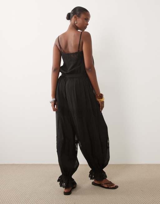 ASOS DESIGN gennemsigtig jumpsuit i blonder med bubble-kant i sort, 3 af 4
