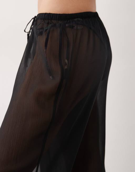 ASOS DESIGN genomskinliga vida strandbyxor i svart, 4 av 5