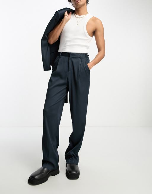 ASOS DESIGN - Geplisseerde pantalon met wijde pijpen in marineblauw