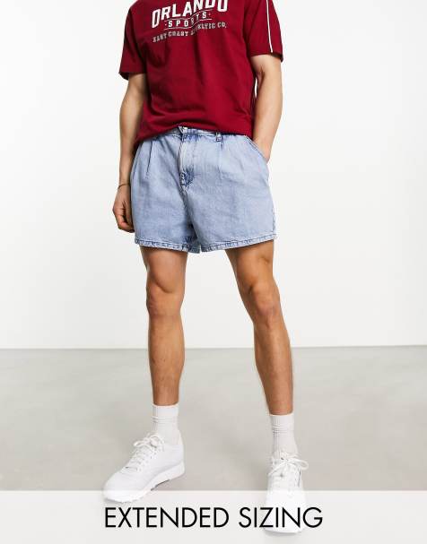 ASOS DESIGN - Geplooide halflange denim short in mid-wash blauw - view 1