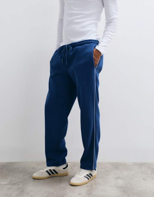 ASOS DESIGN – Gerade geschnittene Jogginghose in Blau mit Paspelierung, 5 von 5