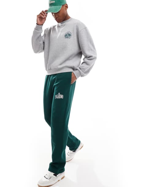 ASOS DESIGN – Gerade geschnittene Jogginghose in Grün mit „Palermo“-Print - view 1
