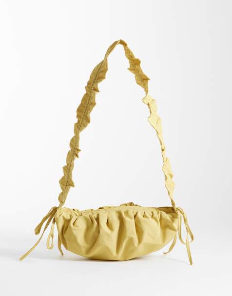 ASOS DESIGN – Geraffte, verstellbare Umhängetasche aus Nylon in Buttermilchgelb - view 1