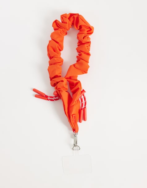 ASOS DESIGN – Geraffter Handyanhänger in Orange - view 1
