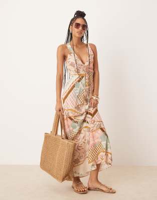 ASOS DESIGN - Gerafftes, gebundenes Midikleid mit abstraktem Blumenmuster in Rosa und V-Ausschnitt-Bunt
