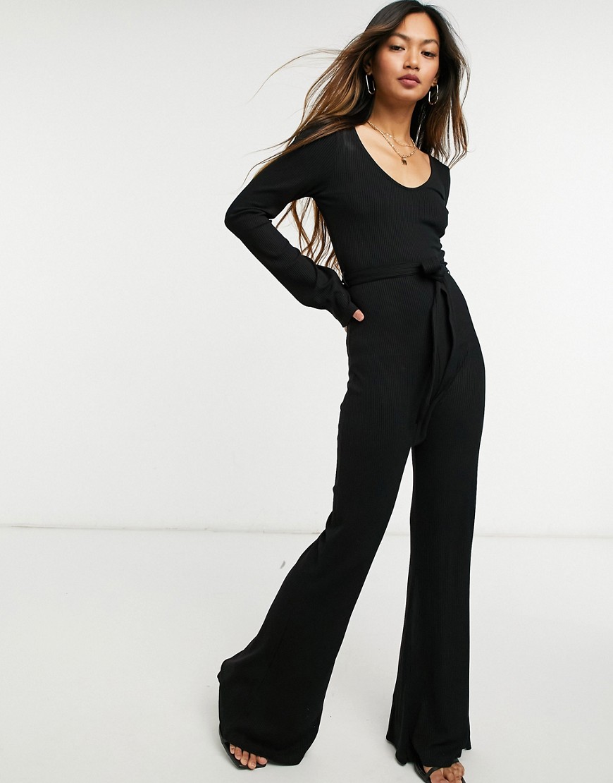 ASOS DESIGN - Geribbelde jumpsuit met lange mouwen en wijde pijpen in zwart