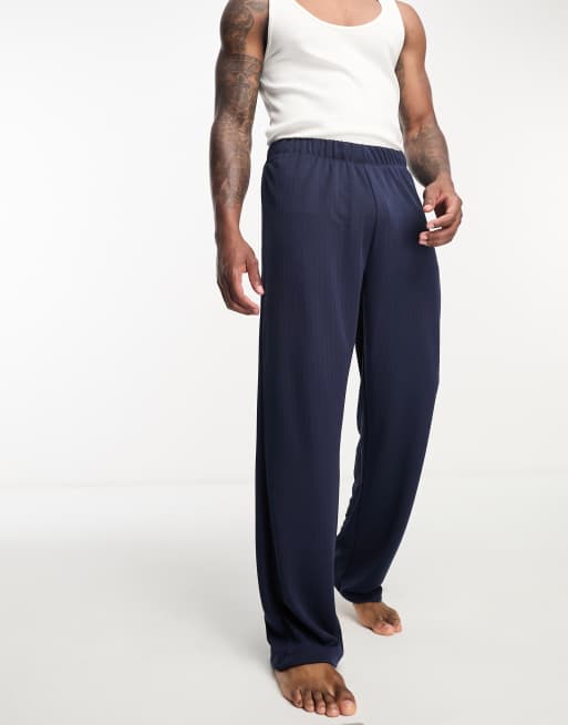 ASOS DESIGN - Geribbelde loungebroek in marineblauw