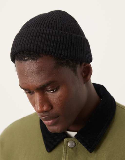ASOS DESIGN - Geribbelde mini vissersbeanie van lamswol in zwart