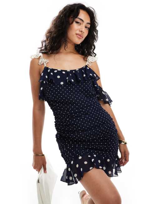 ASOS DESIGN - Gerimpelde mini jurk met ruches en gemixte stippenprint