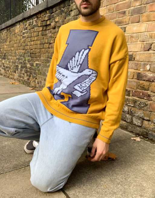 ASOS DESIGN – Gerippter Oversize-Strickpullover mit Logo in Senfgelb
