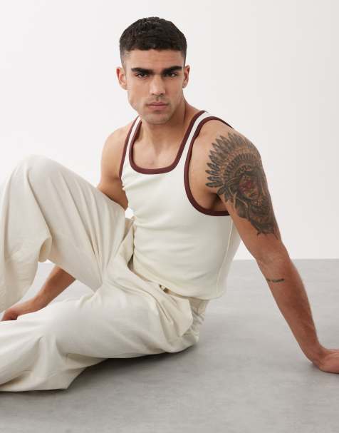 ASOS DESIGN – Geripptes Muskelshirt in Creme mit kontrastierender Einfassung - view 1