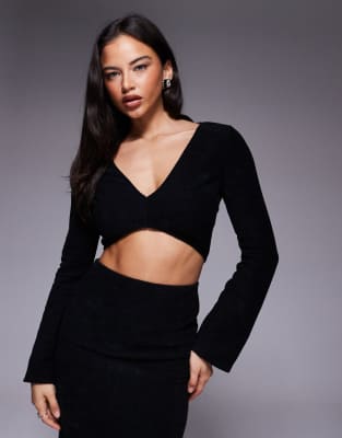 ASOS DESIGN - Geripptes Oberteil aus angerautem Material in Schwarz, mit V-Ausschnitt und ausgestellten Ärmeln, Kombitei...