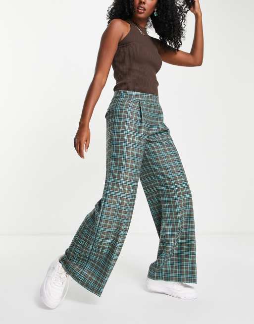 ASOS DESIGN - Geruite broek met wijde pijpen in groen en bruin