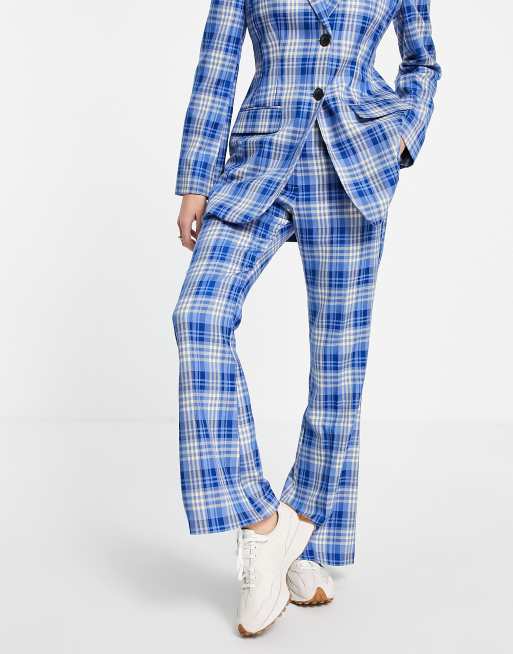 ASOS DESIGN - Geruite pantalon met uitlopende pijpen in blauw