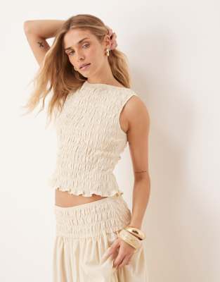 ASOS DESIGN - Gesmoktes, ärmelloses Tanktop in Elfenbeinweiß